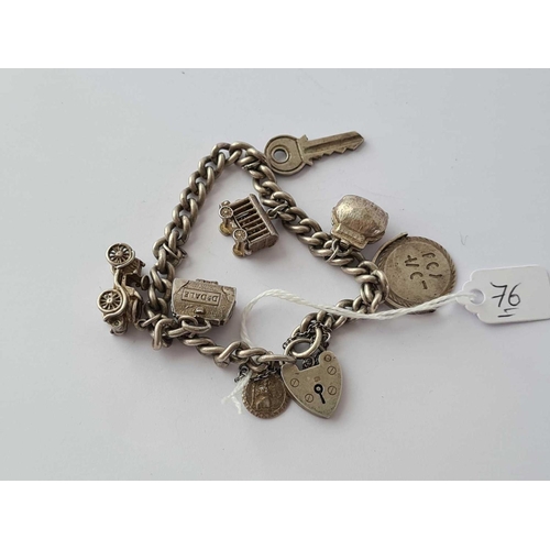 76 - A silver charm bracelet 45g