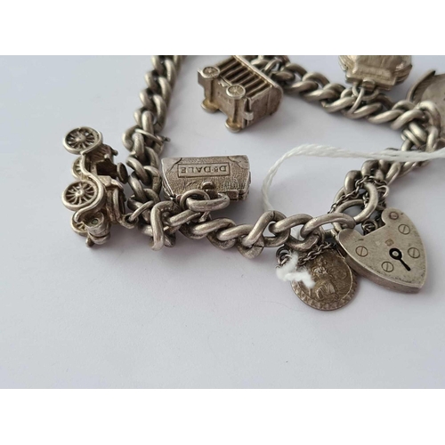 76 - A silver charm bracelet 45g