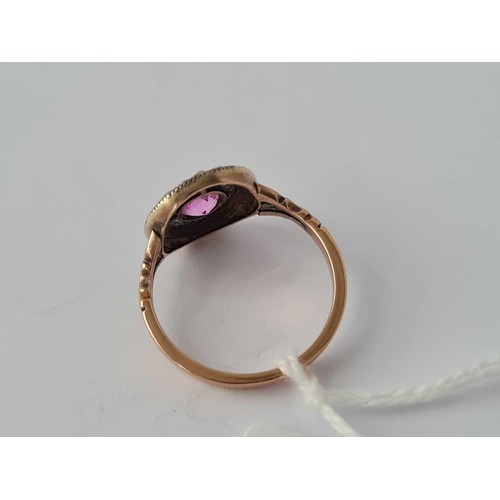 122 - An early pink tourmaline and pearl cluster ring set in gold size M, 2.4 g