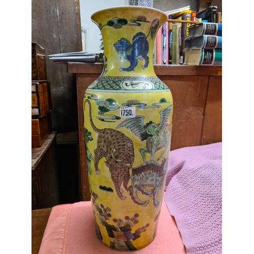 1750 - A good large Chinese vase decorated with stylised lions on a yellow ground, 22.5” high