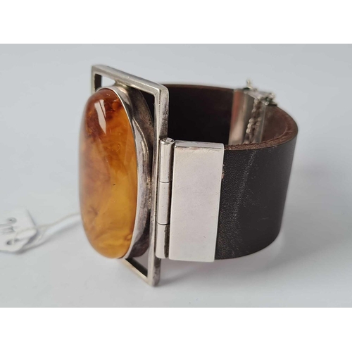 46 - A contemporary amber and silver bracelet