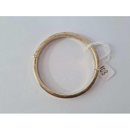 108 - A plain silver bangle