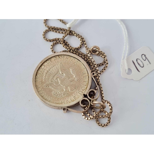 109 - A Liberty half dollar 1964 pendant in silver mount and silver box chain