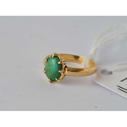 112 - A oval turquoise single stone ring 18ct gold size I      2.3 gms