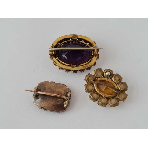 122 - A antique gold mourning brooch and two other dress brooches