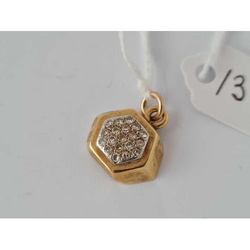 133 - A gold star set pendant      3 gms