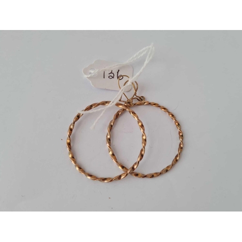 136 - A pair of hoop earrings 9ct         4.9 gms