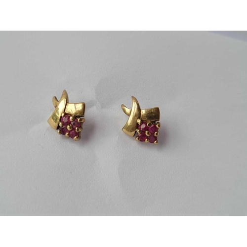 147 - A pair of ruby ear studs, 9ct, 1.2 g