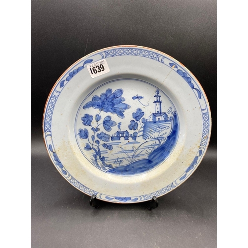 1639 - An 18th Century blue and white Delft plate, 11.5