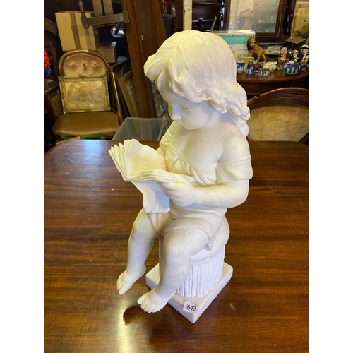 1642 - A carved Marble figure of a young girl reading a book, seated on a Plinth, signed A Piazza of Carrar... 