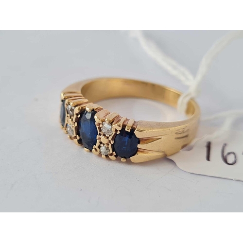 165 - A GOOD SAPPHIRE SEVEN STONE RING SET IN GOLD SIZE R       6.5 gms