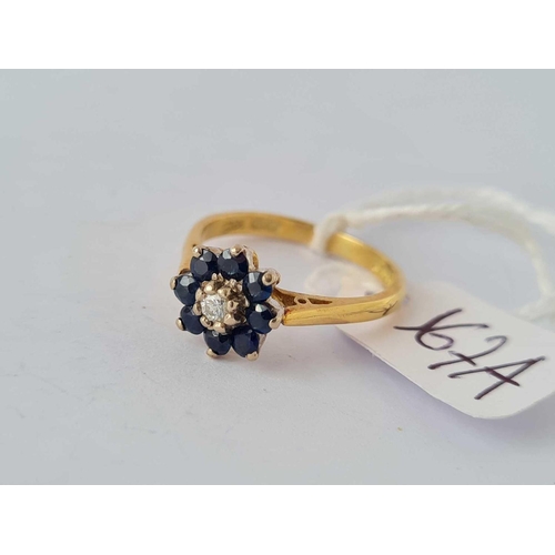 167a - A sapphire and diamond cluster ring, 18ct, size N, 3.6 g.