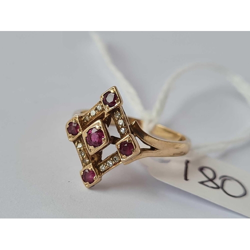 180 - A fine diamond and ruby lozenge shaped ring, 9ct, size O, 3.0 g.