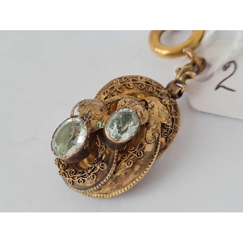 236 - A Victoria gold drop pendant with two stones     3.4 gms