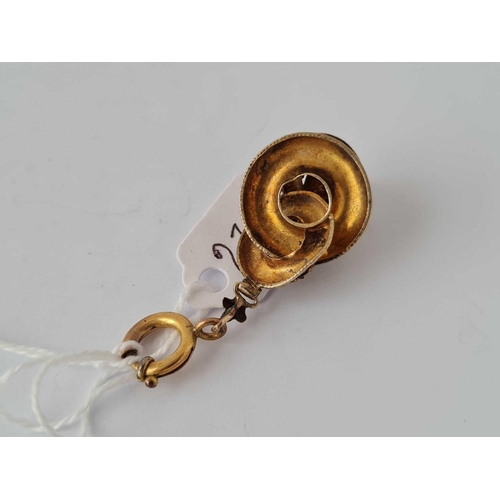 236 - A Victoria gold drop pendant with two stones     3.4 gms