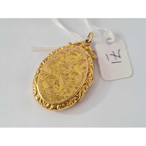 71 - An ornate oval antique 9ct back & front  locket