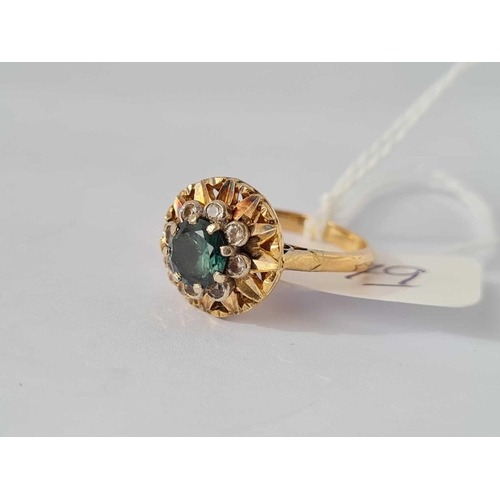 79 - A modernist green zircon cluster ring in 18ct gold size L 4.7g inc