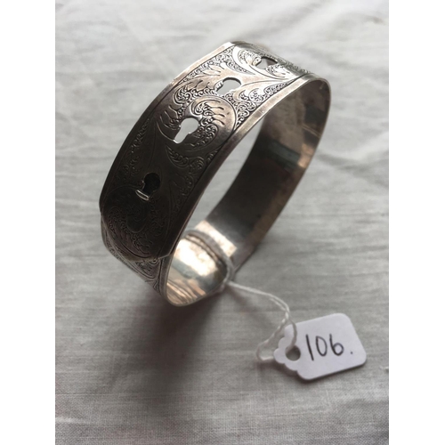 106 - A wide silver buckle bangle