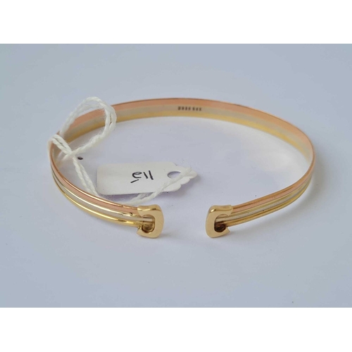 115 - A three colour gold bangle 14ct gold    10.7 gms