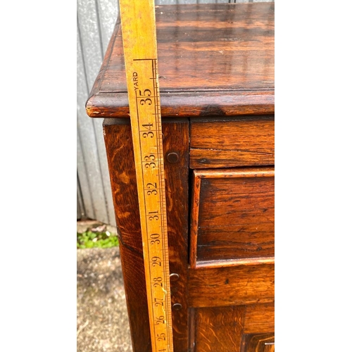 1656 - A George III oak dresser base with 3 drawers to freize and fielded panels and doors under, 4ft 6