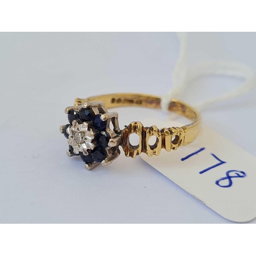 178 - A diamond and sapphire cluster ring 18ct gold size L   3.1 gms