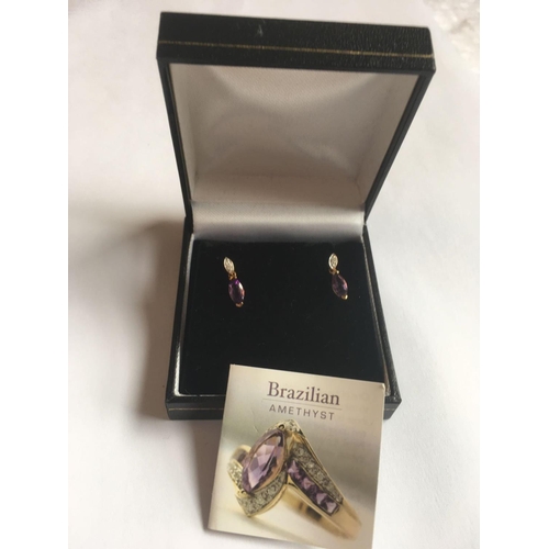 201 - A pair of 9ct amethyst & diamond drop earrings