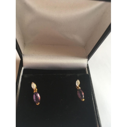 201 - A pair of 9ct amethyst & diamond drop earrings