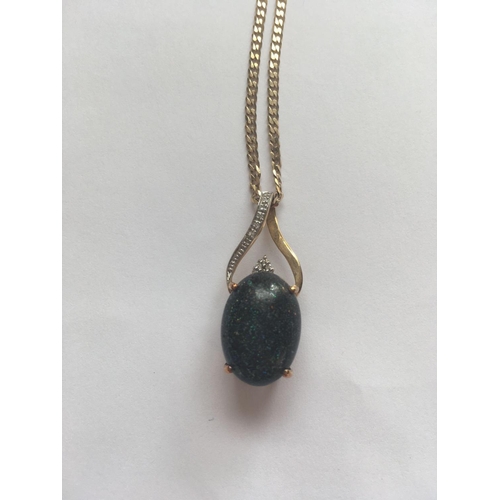 205 - A dark opal & diamond pendant in 9ct mount on 9ct chain 8.5g inc