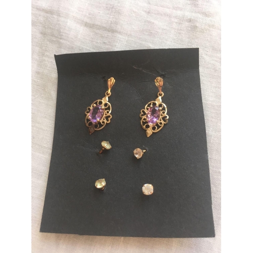 209 - Three pair of 9ct earrings one amethyst drops and two pairs of studs androlok fittings