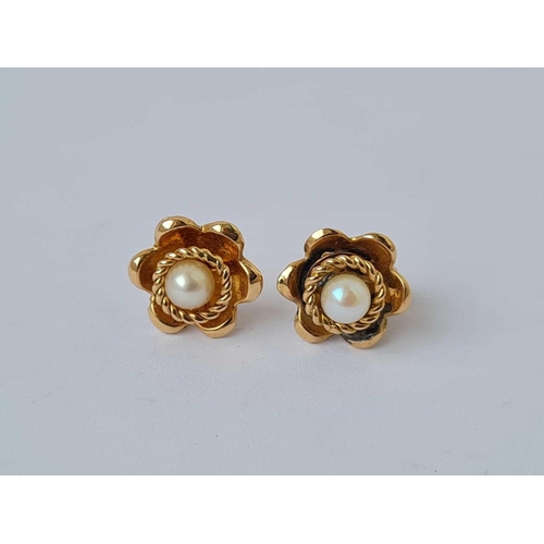 212 - A pair of pearl 9ct earrings