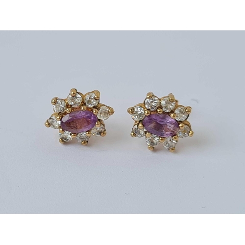 213 - A pair of cluster earrings 9ct