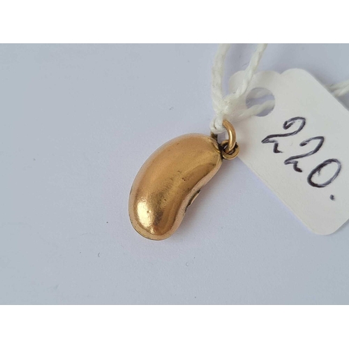 220 - A rose gold kidney bean charm 9ct