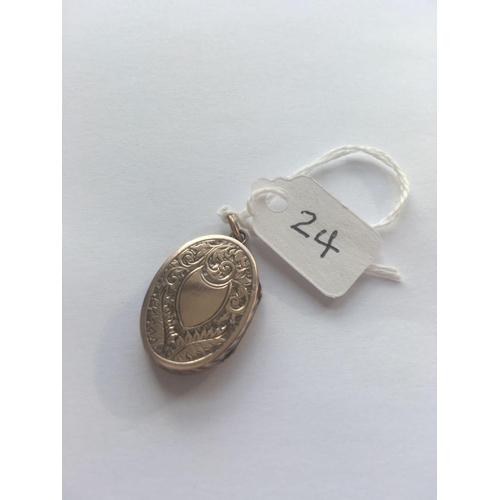 24 - A Victorian oval chased back and front locket