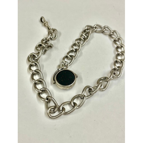 241 - A metal curb link watch chain with silver spinning fob