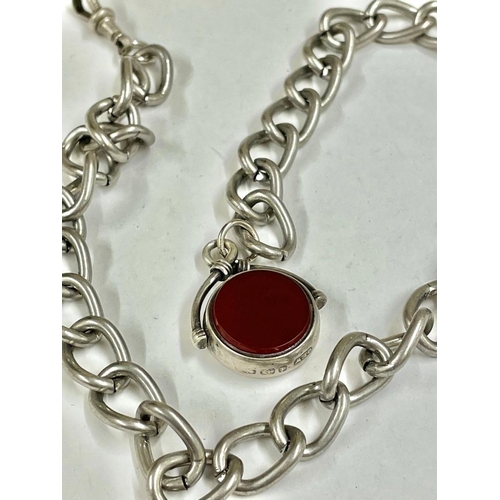 241 - A metal curb link watch chain with silver spinning fob