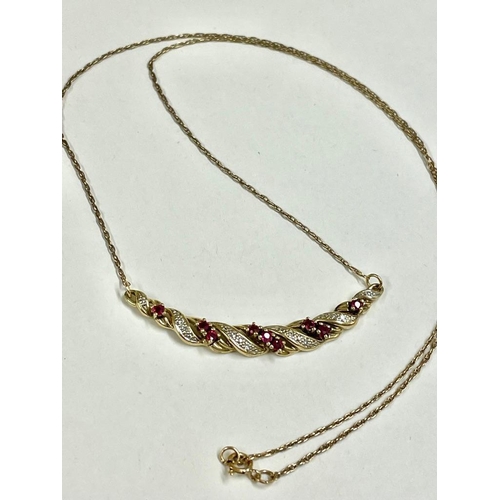 242 - A Vintage diamond and ruby pendant necklace 9ct    3.4 gms