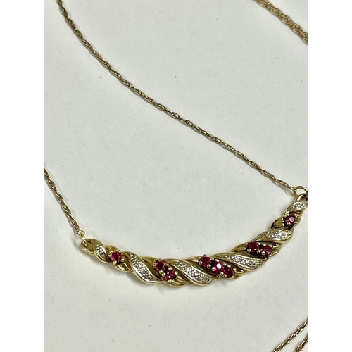 242 - A Vintage diamond and ruby pendant necklace 9ct    3.4 gms