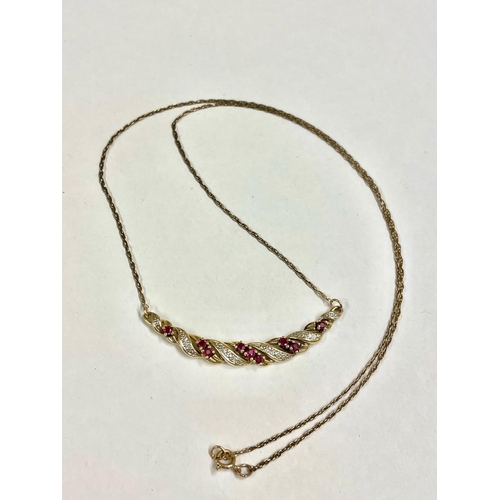 242 - A Vintage diamond and ruby pendant necklace 9ct    3.4 gms