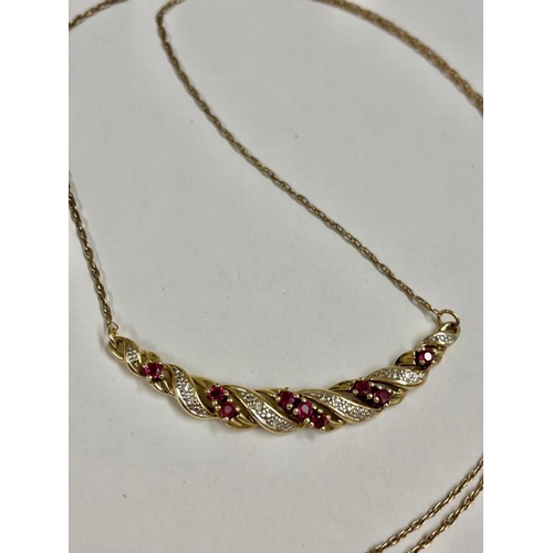 242 - A Vintage diamond and ruby pendant necklace 9ct    3.4 gms