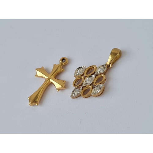 278 - A 14ct gold cross tested together with a 9ct white stone pendant