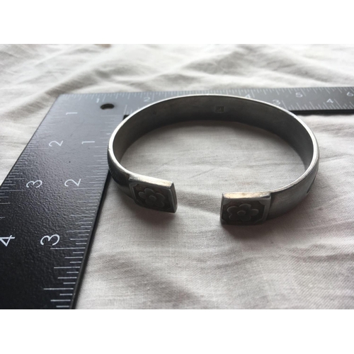 309 - A good Chinese silver bangle with Chinese writing to front