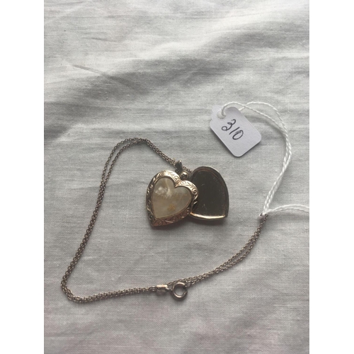 310 - A metal heart mother pendant on silver chain