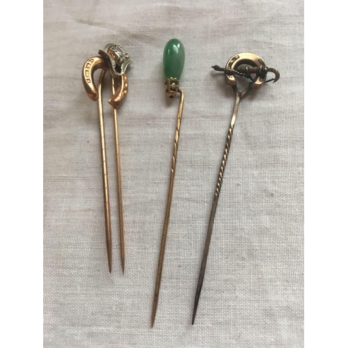 32 - Various gold stick pins with assorted design terminals