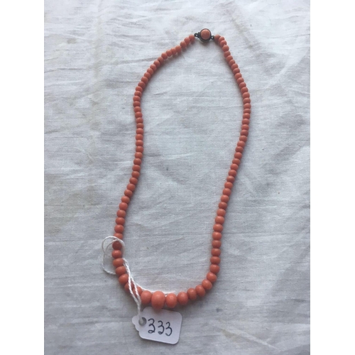 333 - A string of graduated coral beads