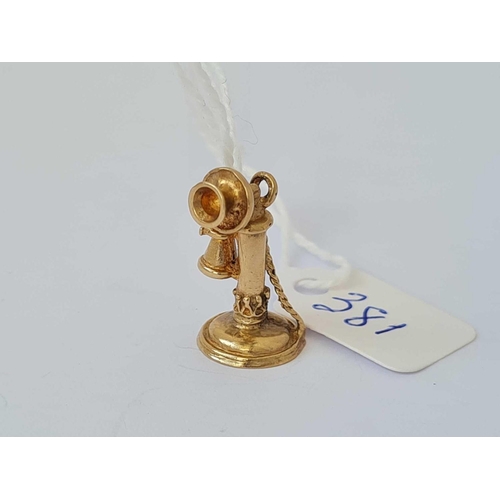 381 - A novelty charm in the form of a candlestick telephone 9ct  3.6 gms