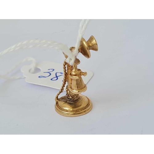 381 - A novelty charm in the form of a candlestick telephone 9ct  3.6 gms