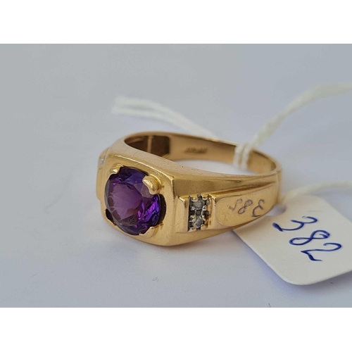 382 - A gold ring set with amethyst and diamond shoulders 14ct gold size X    5.3 gms