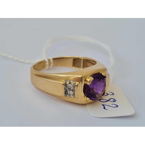 382 - A gold ring set with amethyst and diamond shoulders 14ct gold size X    5.3 gms