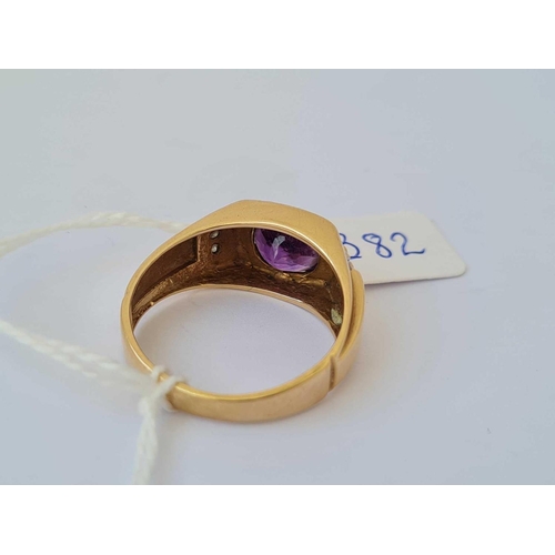 382 - A gold ring set with amethyst and diamond shoulders 14ct gold size X    5.3 gms