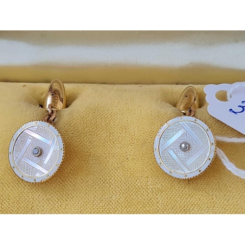 391 - A PAIR OF ENAMELLED CUFFLINKS WITH DIAMOND CENTRES 18CT GOLD